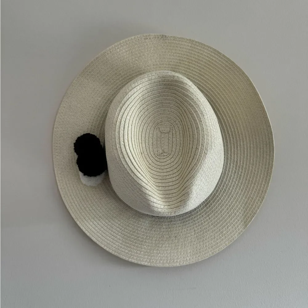 Saks Fifth Avenue Straw Hat with black and white pompoms and embroidered design